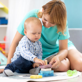 nurse accompanying an elderly patient