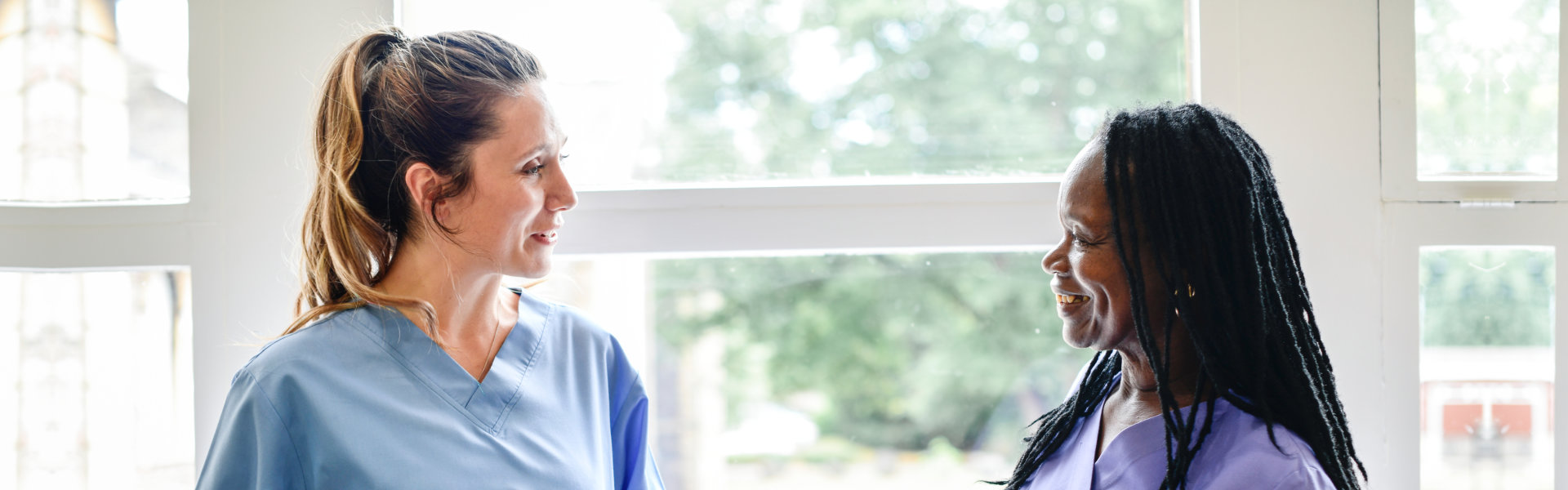 two nurses looking at each other