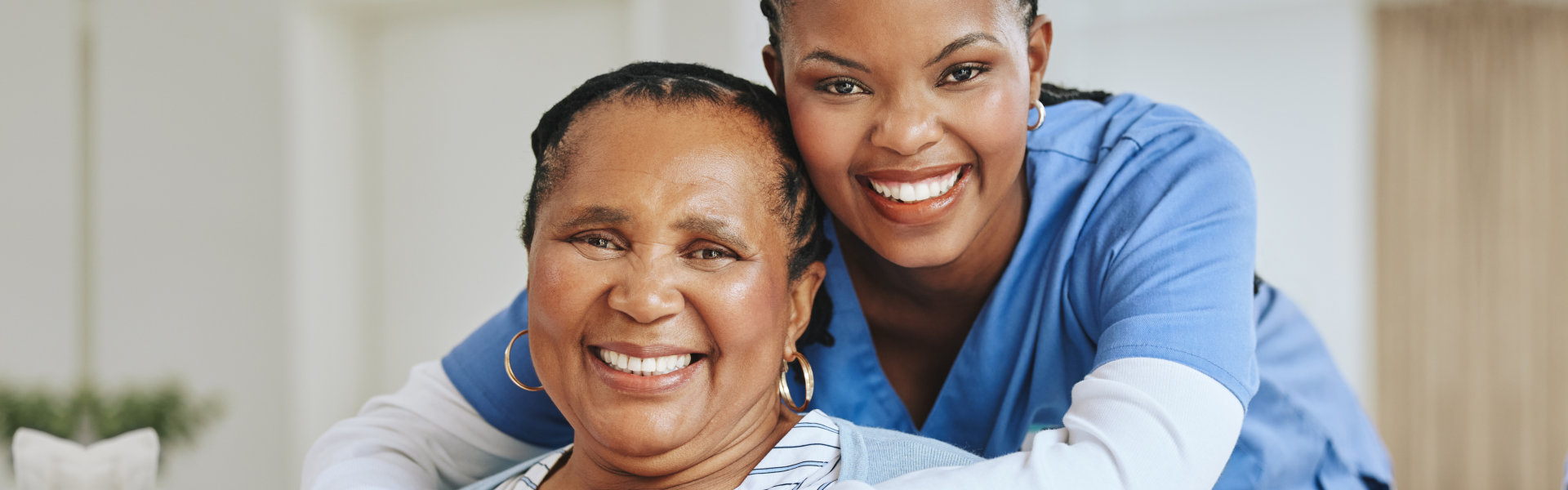 nurse accompanying an elderly patient